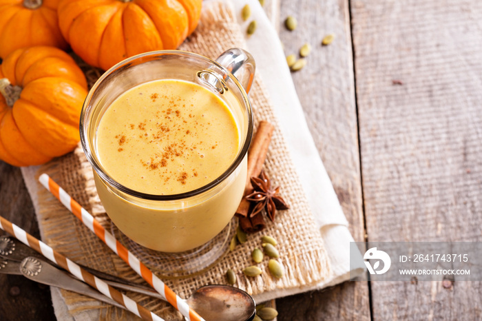 Healthy pumpkin smoothie in big mugs