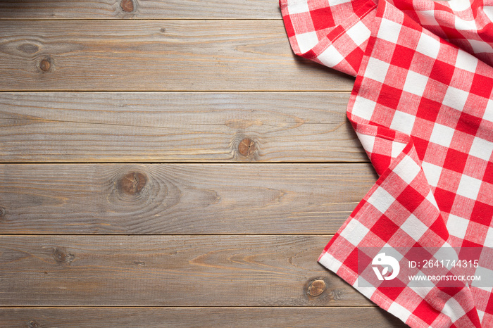 cloth napkin on at rustic wooden table background