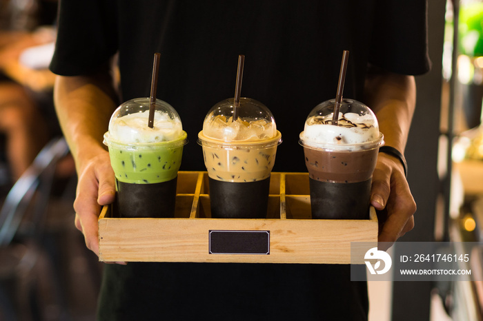 Men holding Beverage drinks ready to serve,cafe style,green tea ,coffee,chocolate