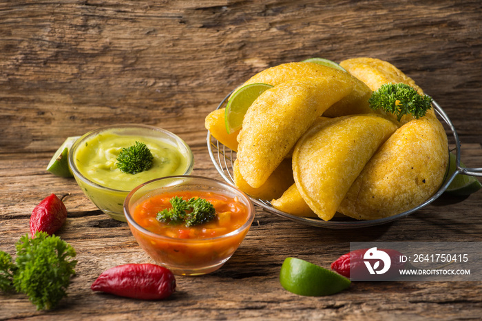 Empanadas with hot sauce, traditional Colombian food