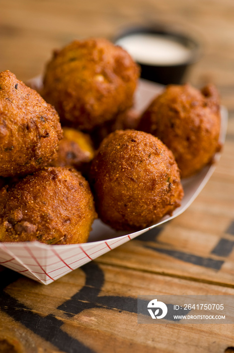 Hush puppies. Deep fried cornmeal made with onions, garlic and butter. Classic Cajun cuisine appetiz