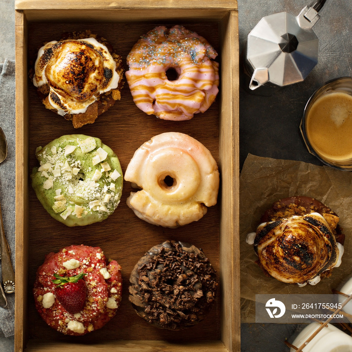 Variety of donuts in a wooden box