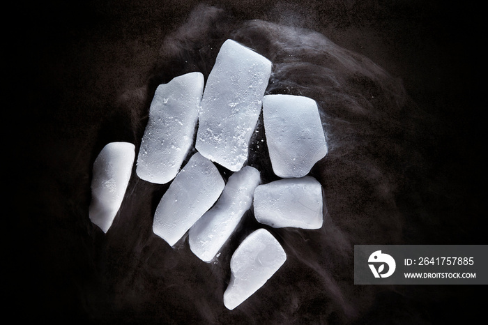 Dry ice on black background