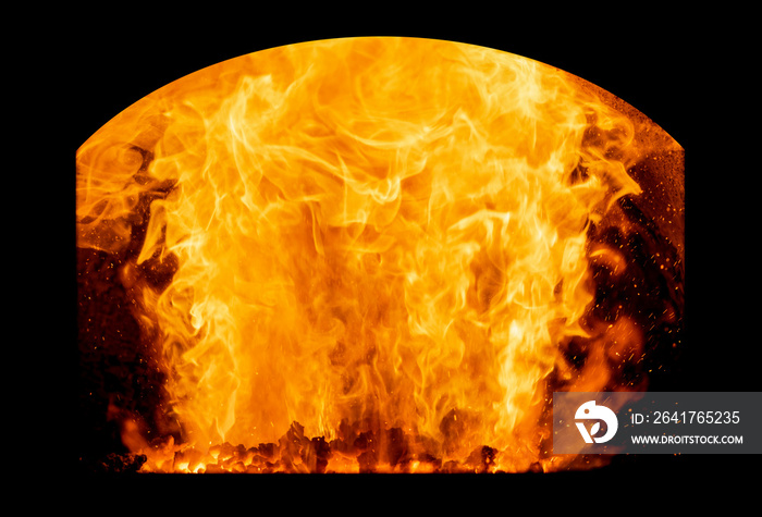 Close-up fire flames in coal boiler. Fire flames with glowing coal embers.