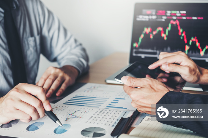 Business Team Investment Entrepreneur Trading discussing and analysis graph stock market trading,sto