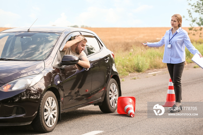 Instructor conducting driver licence test