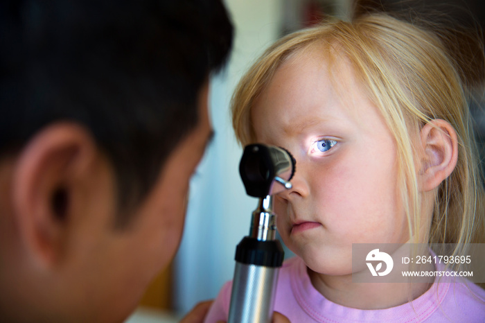 Girl being examined