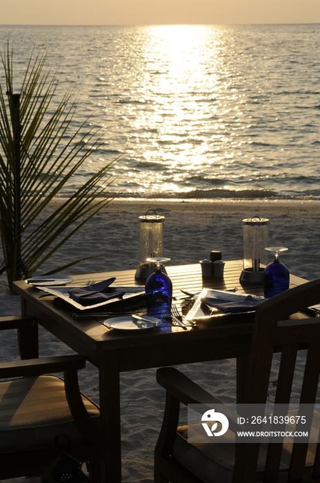 Table and chairs at beach, Maldives, Indian Ocean