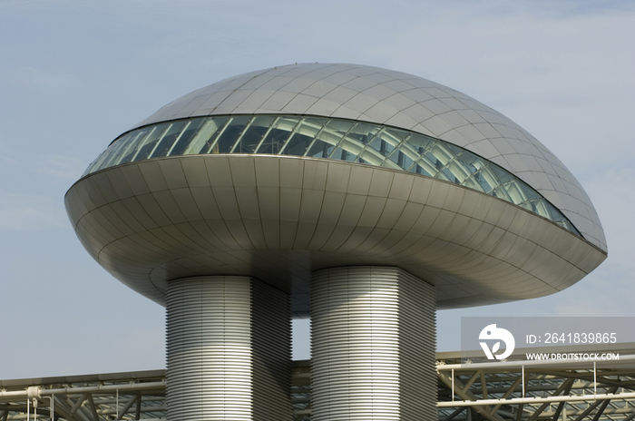 Low angle view of a modern building against clear blue sky