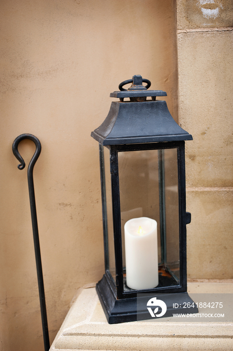 Close-up of a candle lantern against wall; Rancho Sante Fe; USA