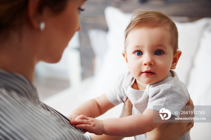 Portrait of confused baby looking at camera