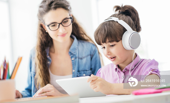 Mother and child watching videos together