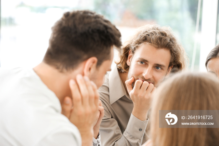 Young people at group therapy session