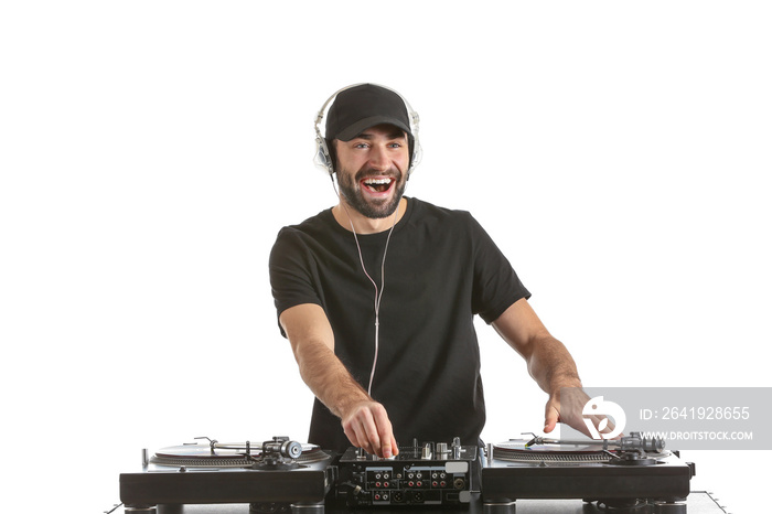 Male DJ playing music on white background