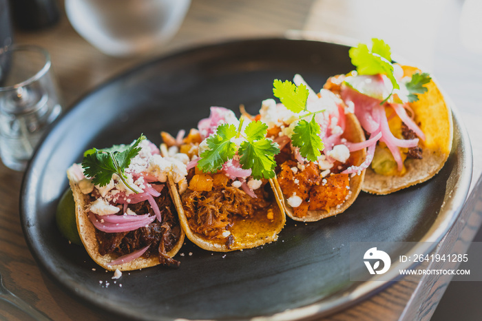 plate of colorful mexican street tacos