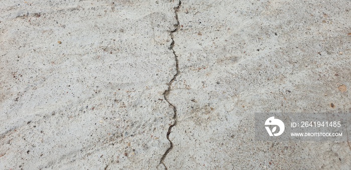 Crack in concrete. Cracked foundation. Cracked road.