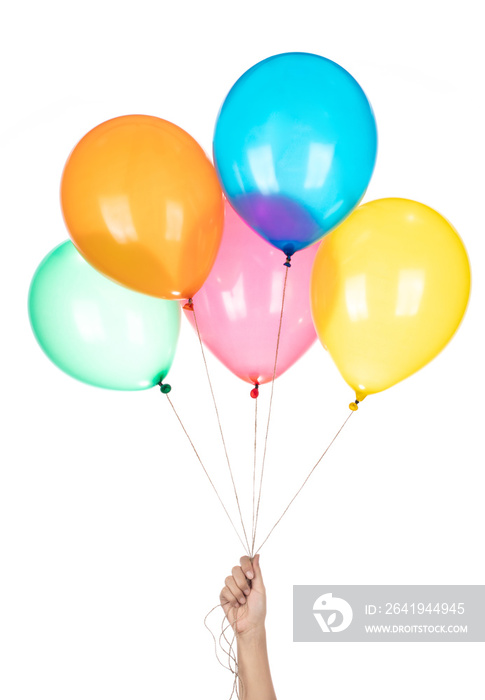 Hand holds colorful balloons isolated on a white background.