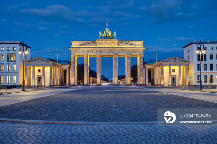 Panorama of the illuminated Brandenburger Tor in Berlin at dawn with no people