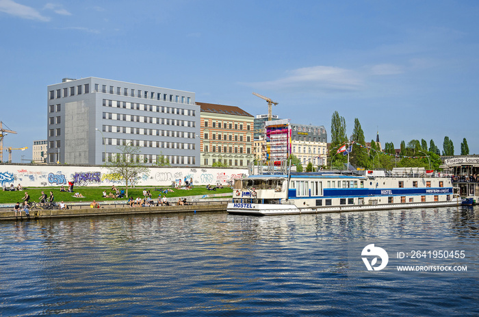 Banks of the river Spree with the East Side Gallery, Eastern Comfort Hostel Boat and Floating Lounge