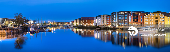 Panorama of the colorful houses and  the Nidelva River, Trondheim, Norway.