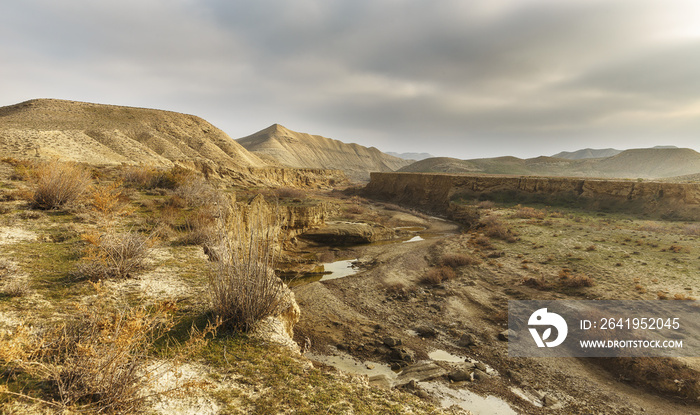 The bed of a dried-up river in the mountains