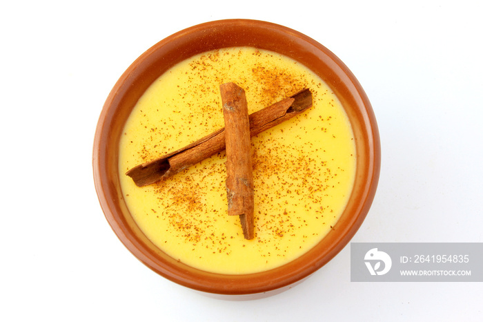 Curau, cream of corn sweet and dessert typical of the Brazilian cuisine, with cinnamon placed in cer