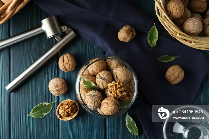 Concept of healthy food with walnuts on wooden background