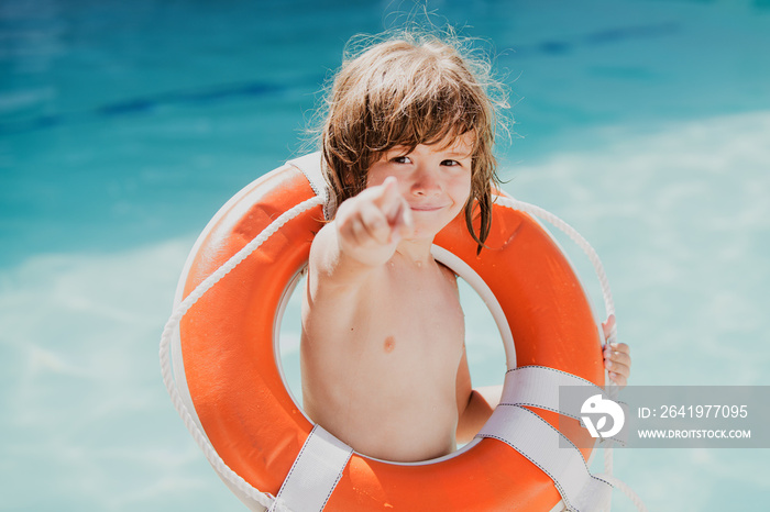 Be careful on water. Kids saving life. Helping concept. Child with rescue circle. Summer beach.