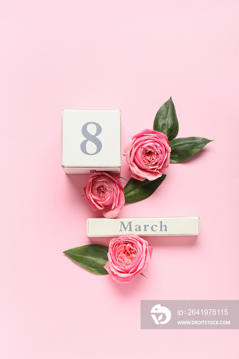 Calendar and flowers for International Womens Day celebration on pink background