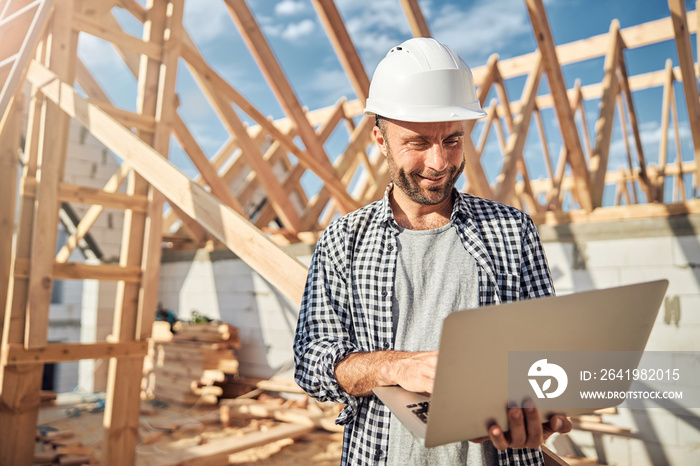 Good-looking man in charge of construction management