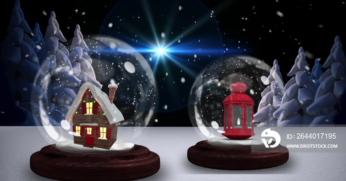 Image of two snow globes with house and christmas lantern with snow falling in winter scenery