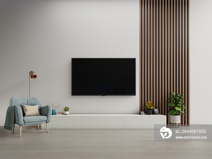 现代客厅橱柜上的电视，白色深色墙壁背景上的扶手椅，三维渲染