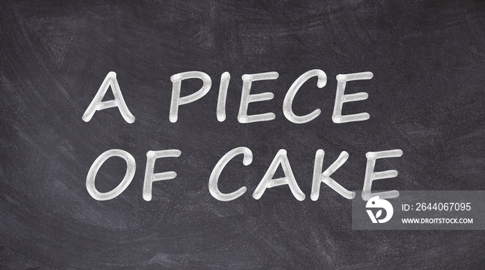 A piece of cake written on blackboard