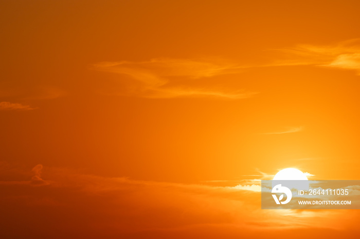 Golden hour sunset. View of sun. Details of sunset with orange sky.