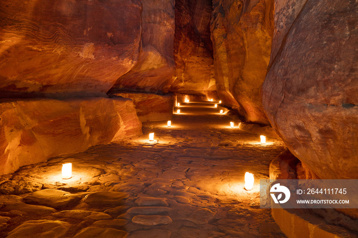 lighting candles in canyon in Jordan