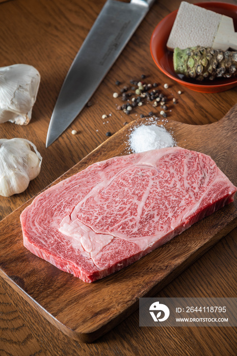 japanese wagyu ribeye beef on wooden cutting board