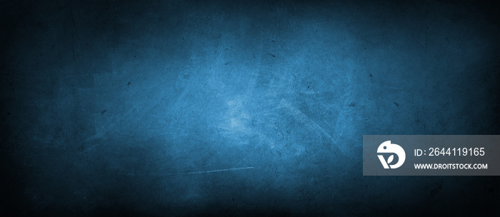 Blue textured concrete wall background. Dark edges