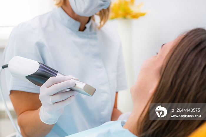 Prosthodontics - Dentist Using 3D Dental Camera for Scanning Teeth.