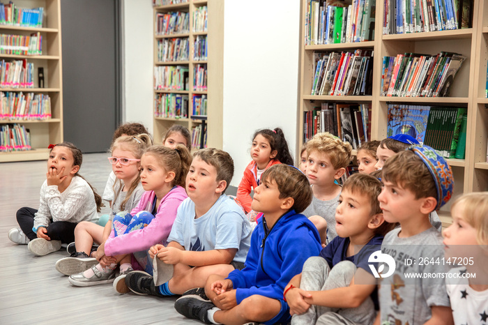 Children sitting in a classroom