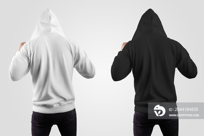 Set of white, black hoodie on a guy, adjusting the hood, back, isolated on background.