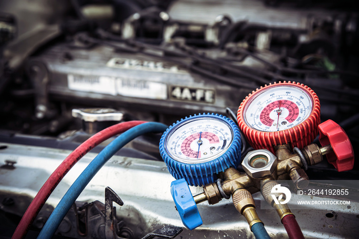 Close up the measuring manifold gauge for filling car air conditioners. Concepts of fix and checking