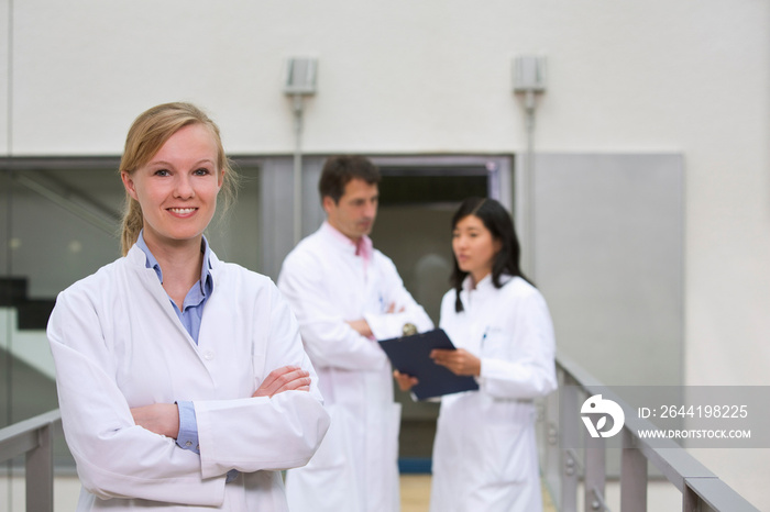 Group of  scientists in atrium