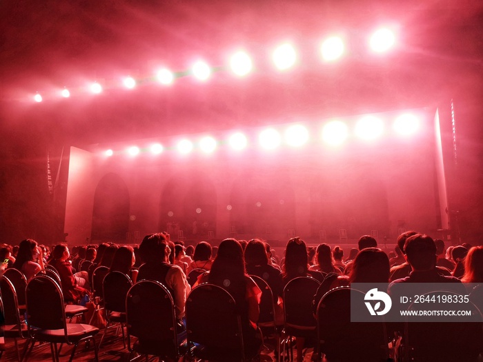 Blurred crowd at social distancing concert venue in Thailand during the coronavirus (covid-19) : Sil