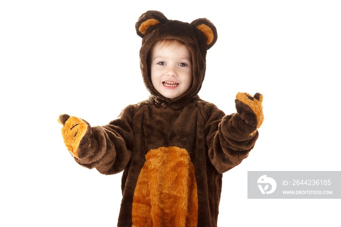 Child in a christmas carnival bear costume isolated on white with copy space,  celebrating.