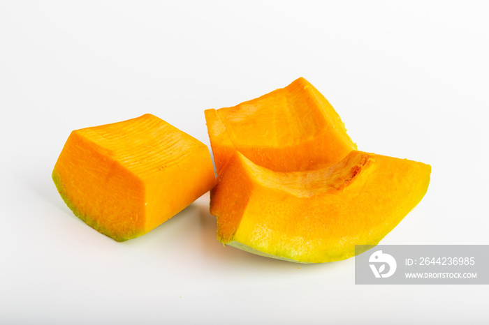 Isolated pumpkin slices over white, studio shot. Includes copy space.