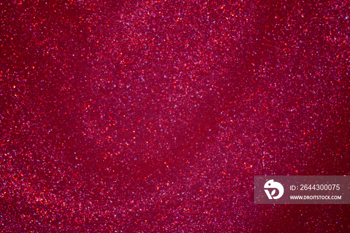 Red Golden glitter dust bokeh background.