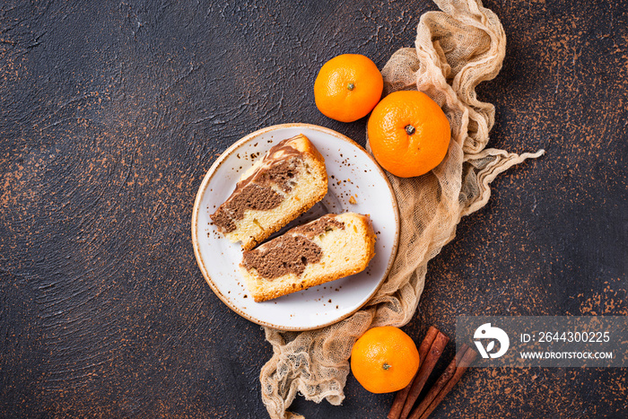 Homemade marble cake with chocolate and orange