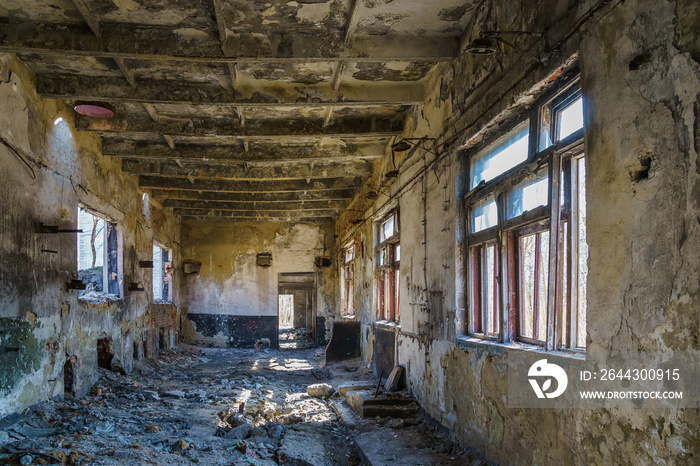 Destroyed and abandoned military barracks. Background with selective focus and copy space