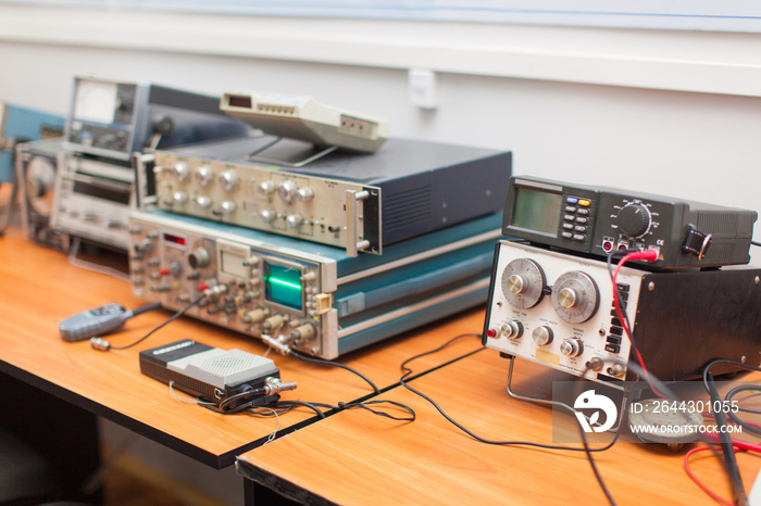 photo of digital measuring devices in the laboratory, repair shop of electronics