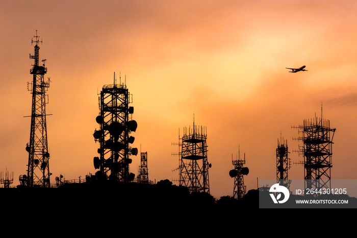 many type of communication towers  with airplane